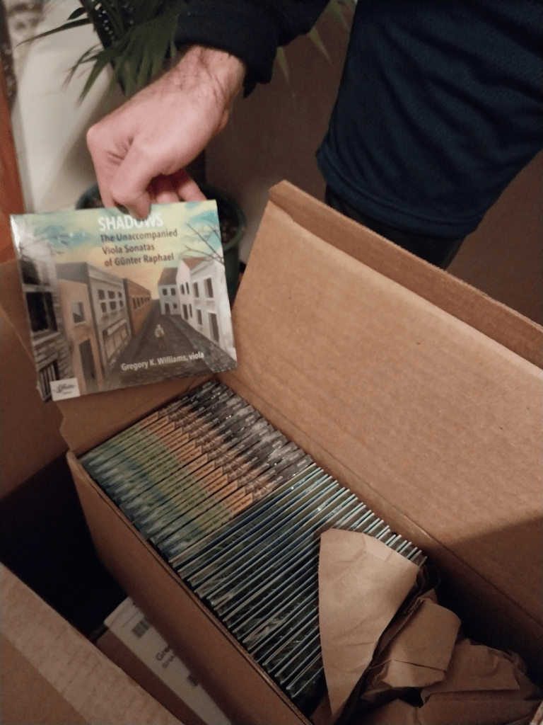 An entire box of CDs of SHADOWS; Gregory Williams' debut album